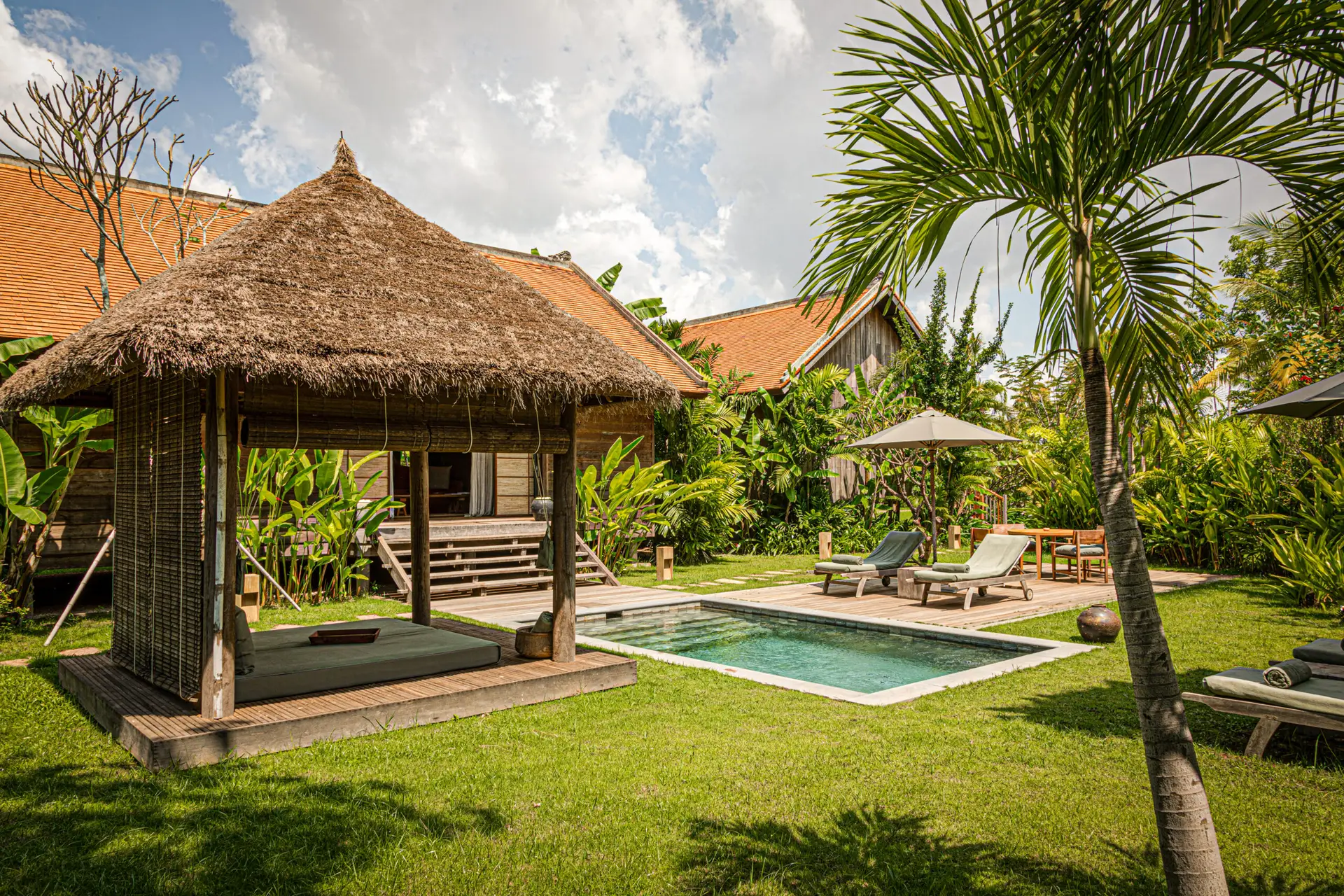 Phum Baitang channelling traditional Khmer villages with its villa style and distribution throughout lush fields.